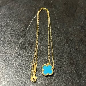 Women’s replica clover pendant